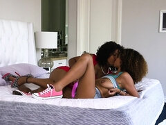 Misty Stone and Raven Redmond licking passionately in bed