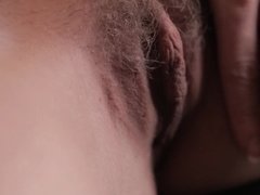 A lovely hairy cunt is on display in the solo kinky and hot video