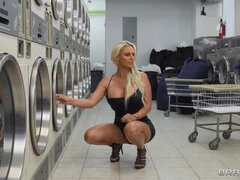 Curvaceous blonde damsel with big tits pleasures JMac in the laundry