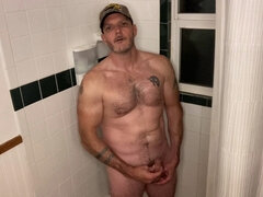 Naughty daddy talking dirty while taking a piss and stroking himself off