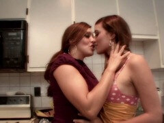 Hot lesbian seduction as the babes pleasure each other on the chilly kitchen floor