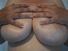 Drenching my massive DDD breasts in oil and indulging in some naughty playtime!