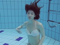 Roxalana Cheh sexy redhead underwater