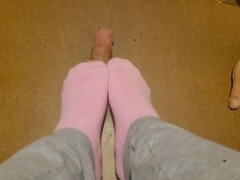 Cute feet in pink socks trampling and getting rock hard treatment