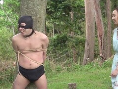 Mistress restrains sub to tree in woods, whips & abandons with head out, ignores all night