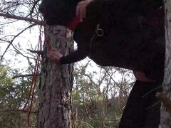 Tied Up To A Tree Outdoor On Sultry Clothes