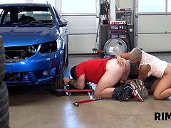 Chloe Lamour gets her big tits and asslicked in the garage by a mechanic