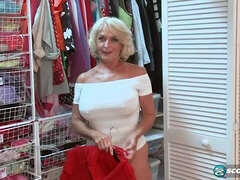 Short-haired mature Georgette Parks shows off her nice boobies