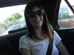 Gorgeous brunette babe gets seduced inside the car
