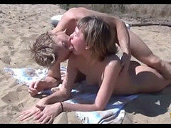 Shameless public 3 way on the naked beach