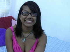 Horny Indian brunette with glasses lets you watch her play in bed