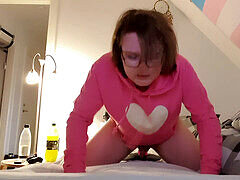 Lovely femboy rides dildo in pink hoodie