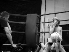 Lesby beauties wrestling in a boxing ring