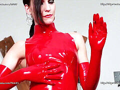 Gorgeous Italian dominatrix in seductive red latex outfit