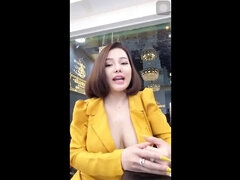 Sexy Vietnamese Brunette with Big Tits in Fashion Salon - Who is She?